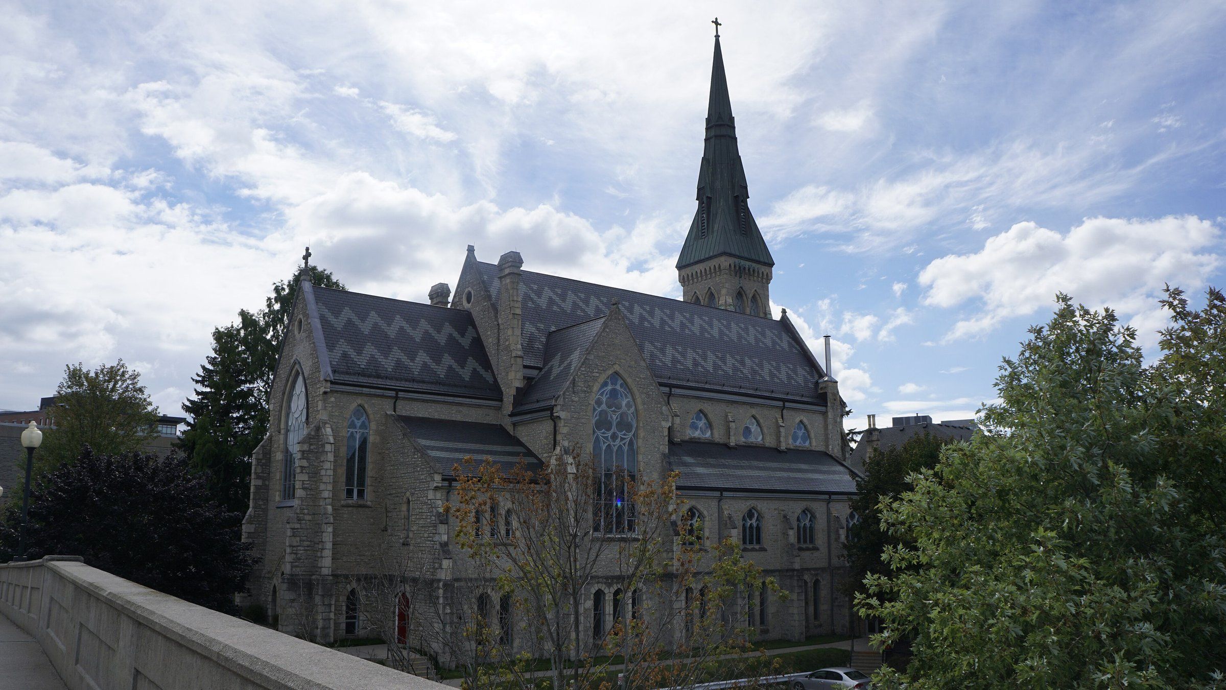 St. George's Anglican Church, a grey stone Gothic church with a tall spire